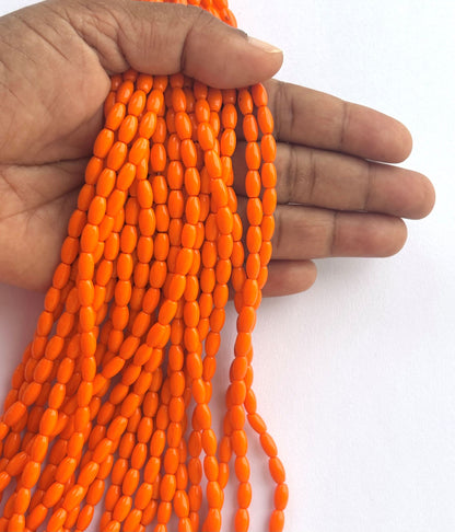 Smooth High Shine Monalisa Bright Orange Oval Beads