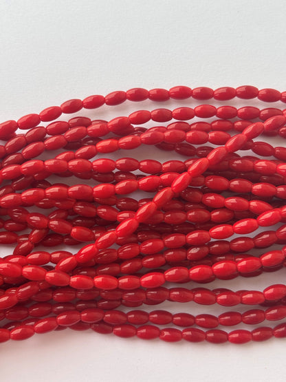 Smooth High Shine Monalisa Deep Red Oval Beads