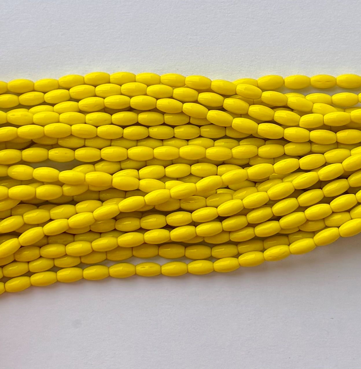 Smooth High Shine Monalisa Bright Yellow Oval Beads