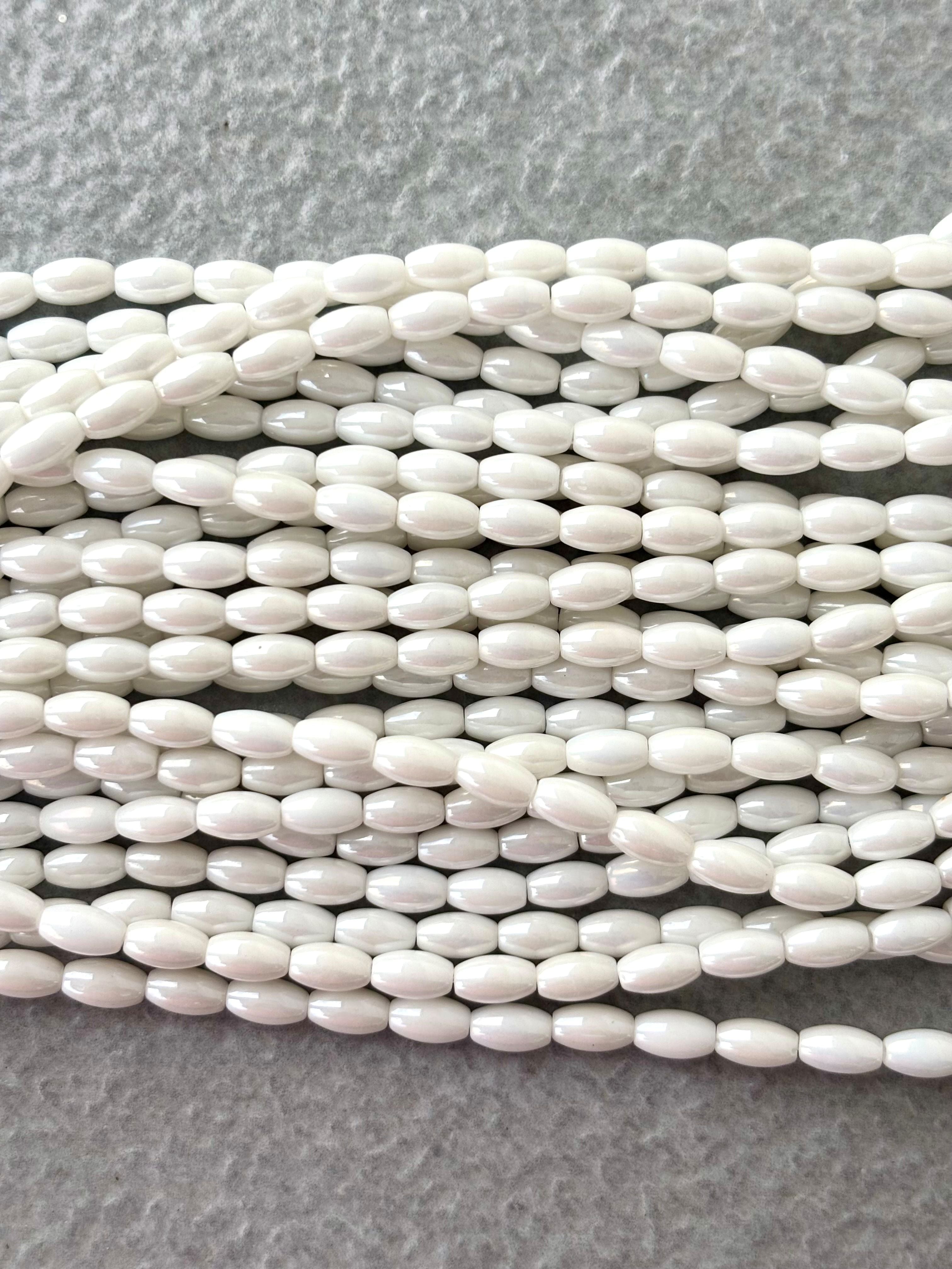 Smooth High Shine Monalisa White Oval Beads