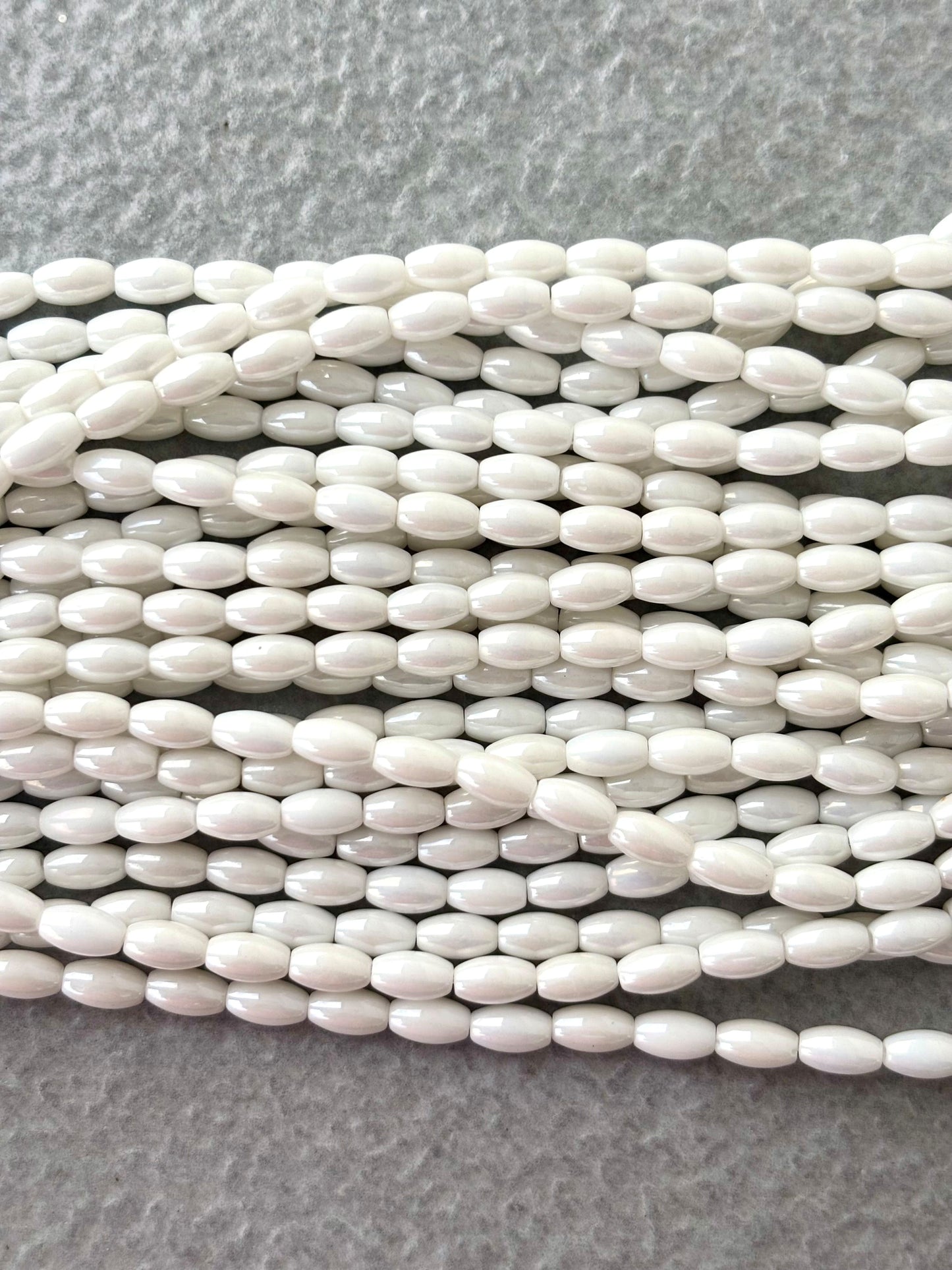 Smooth High Shine Monalisa White Oval Beads
