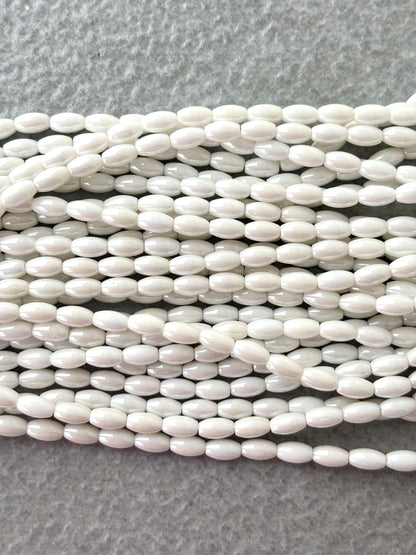 Smooth High Shine Monalisa White Oval Beads