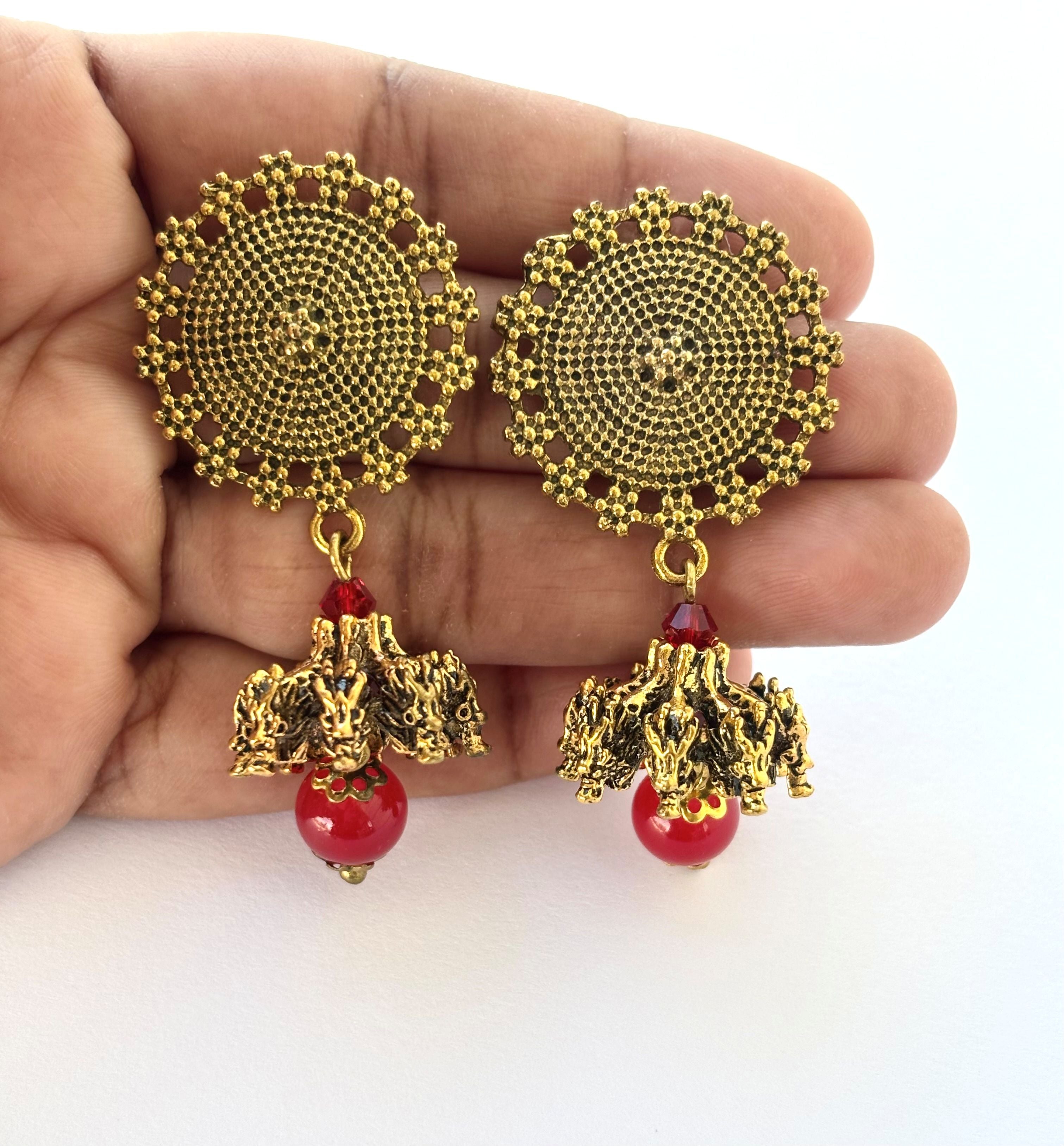 Antique Gold-Plated Jhumkas with Red Beads