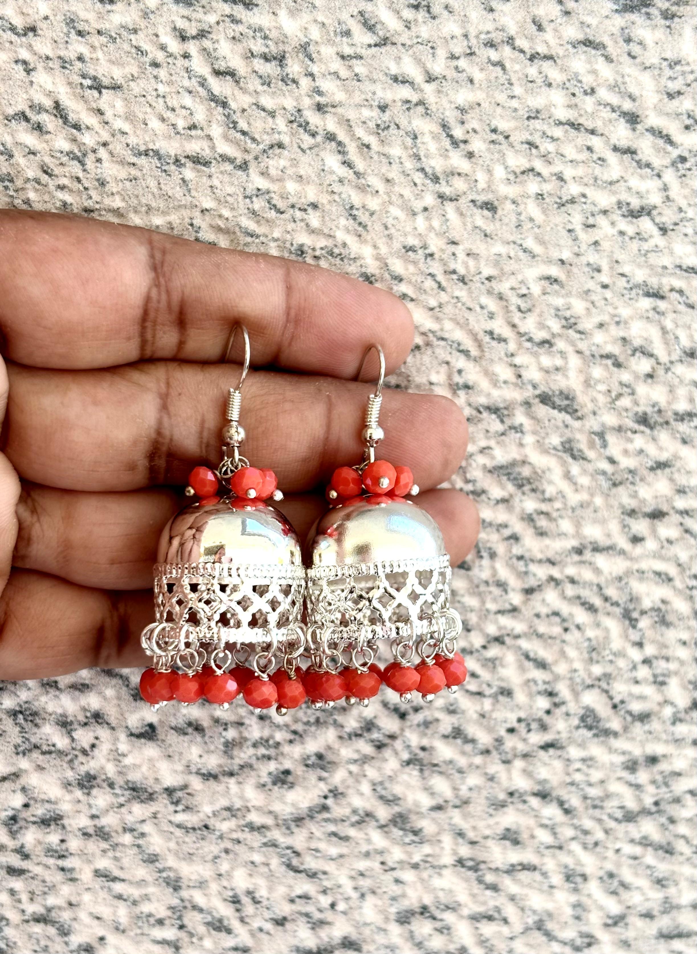 Polished Silver Jhumka Earrings with Coral Color Beads