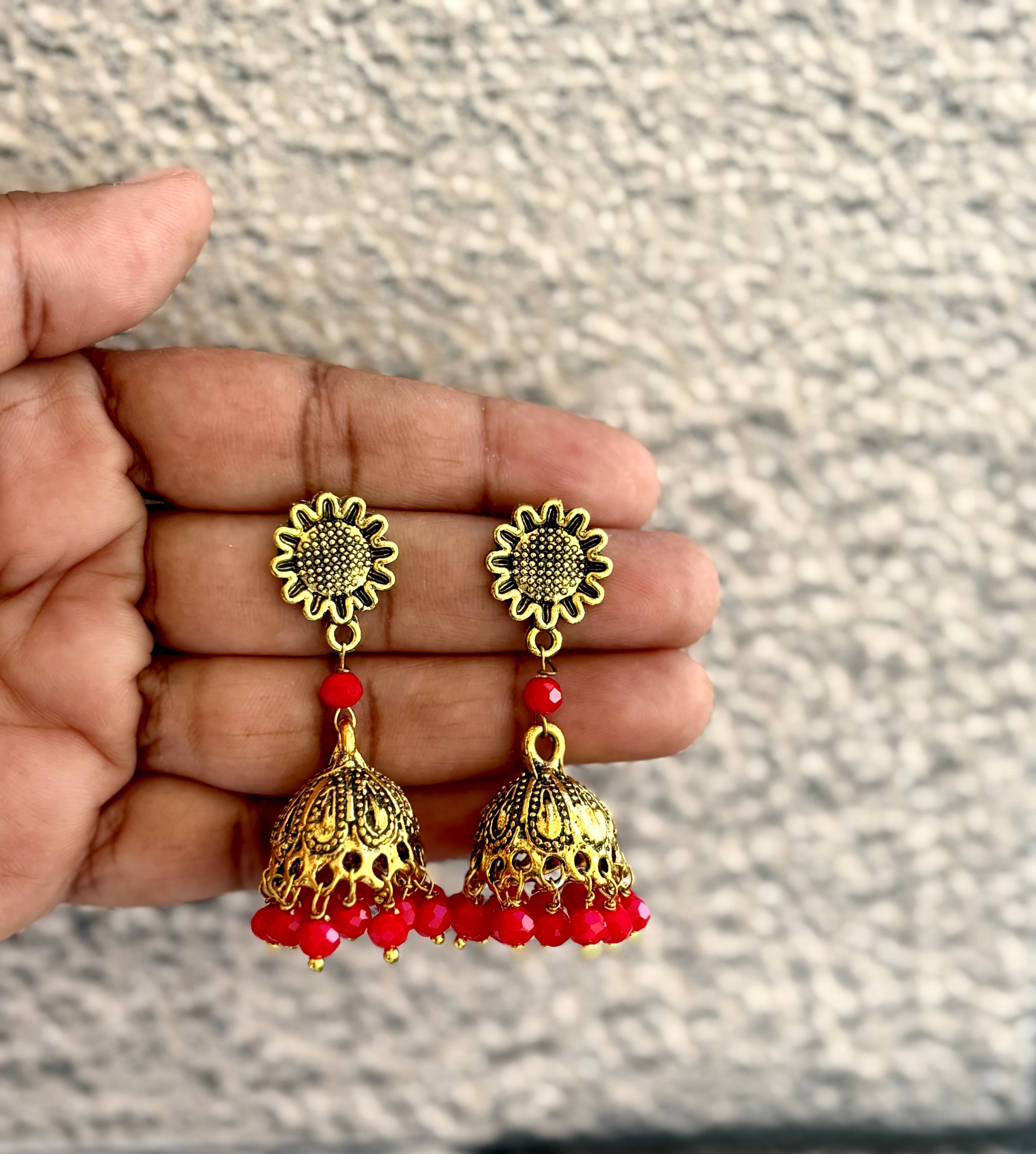 Antique Gold Jhumka Earrings with Red Beads