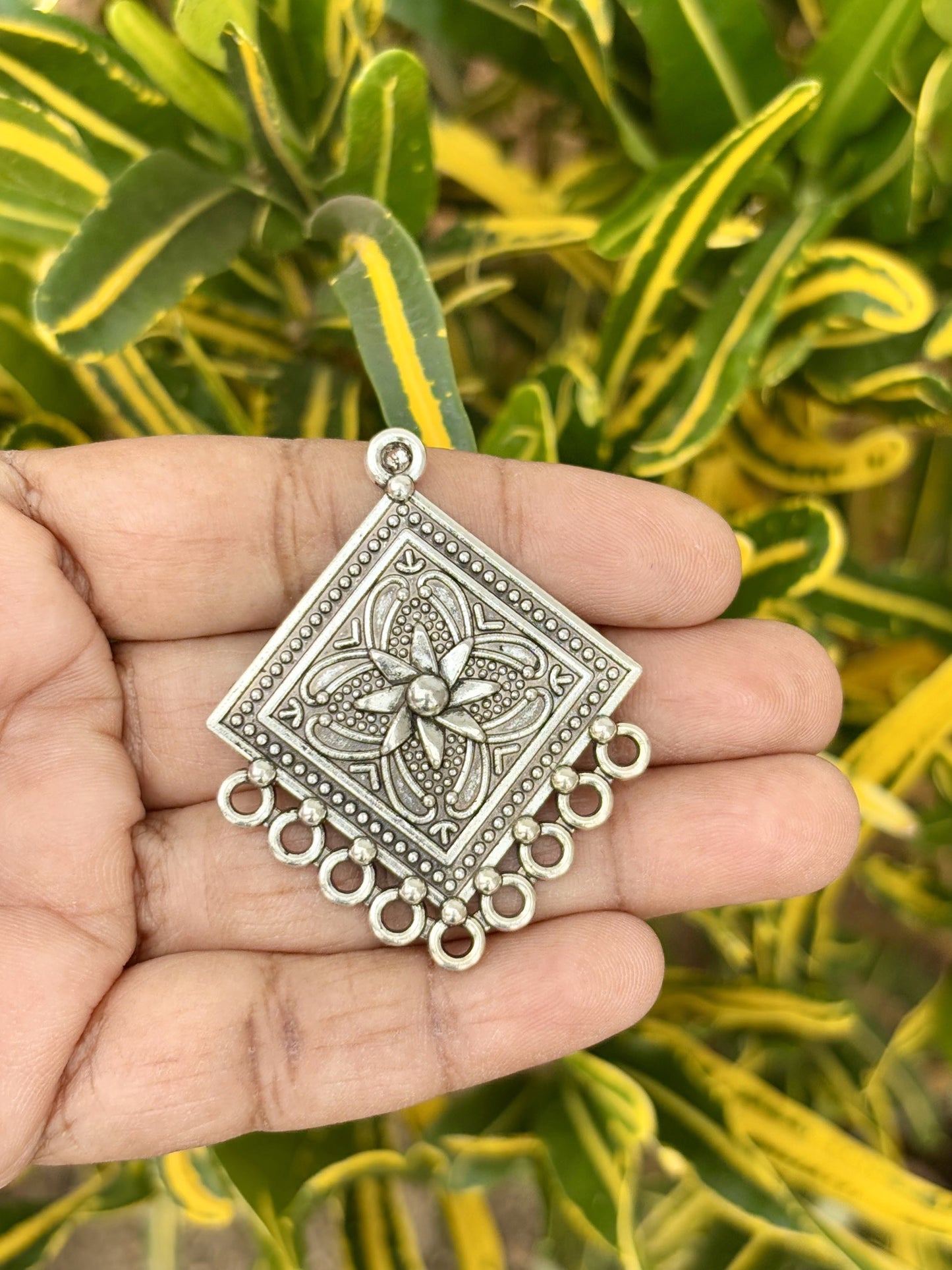 Intricate Silver Pendant