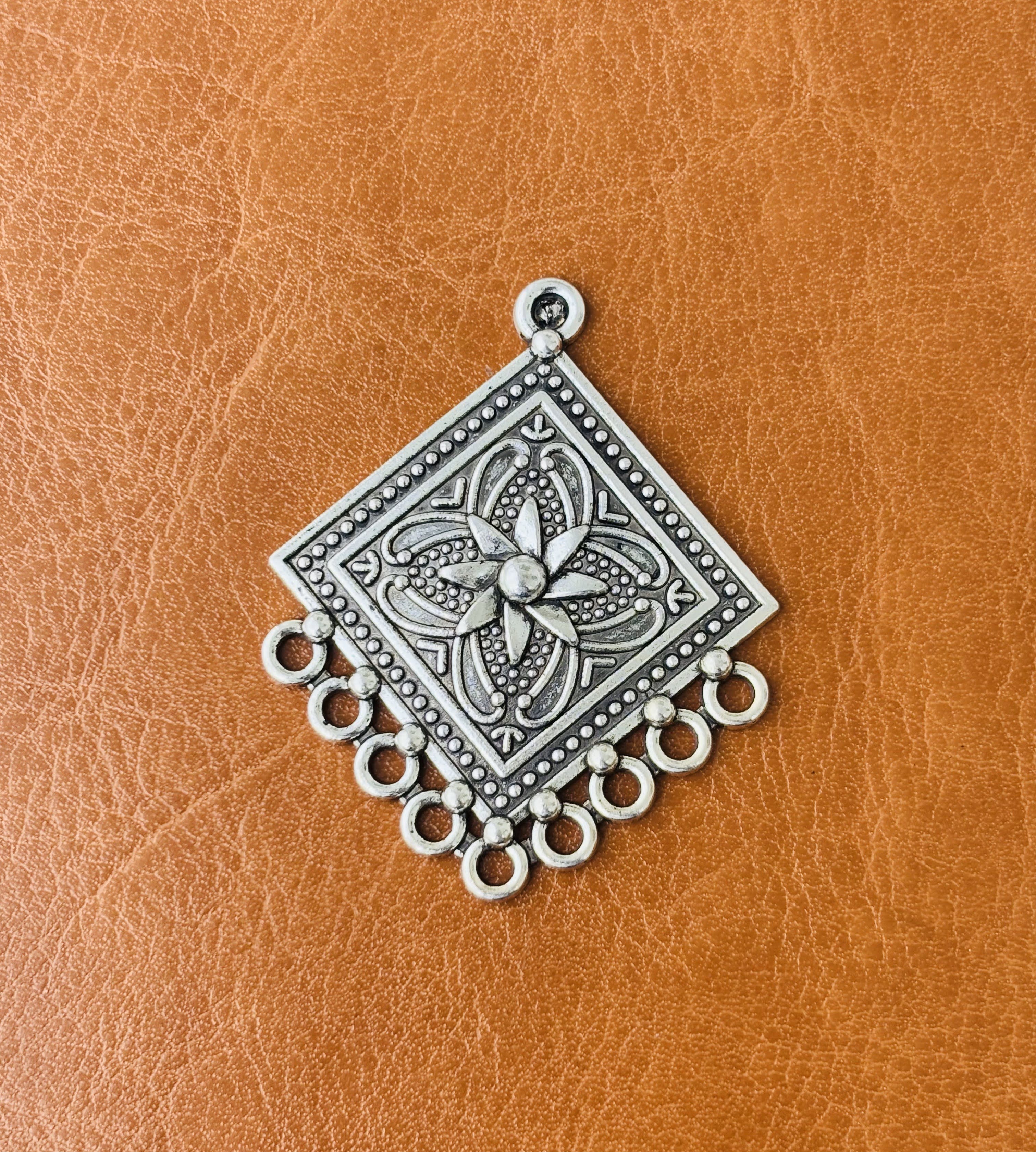 Intricate Silver Pendant
