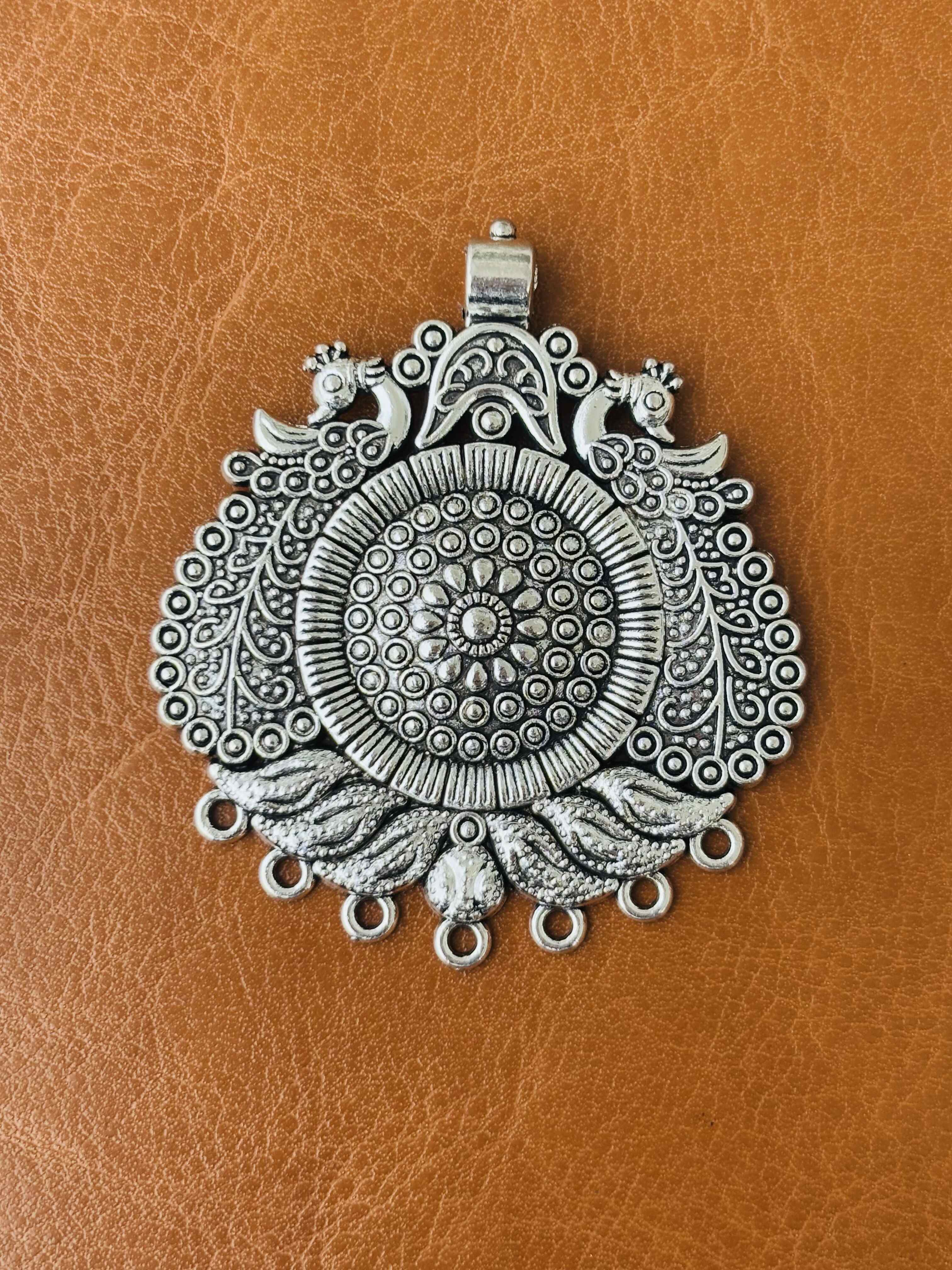 Bird and Circular Motifs Pendant