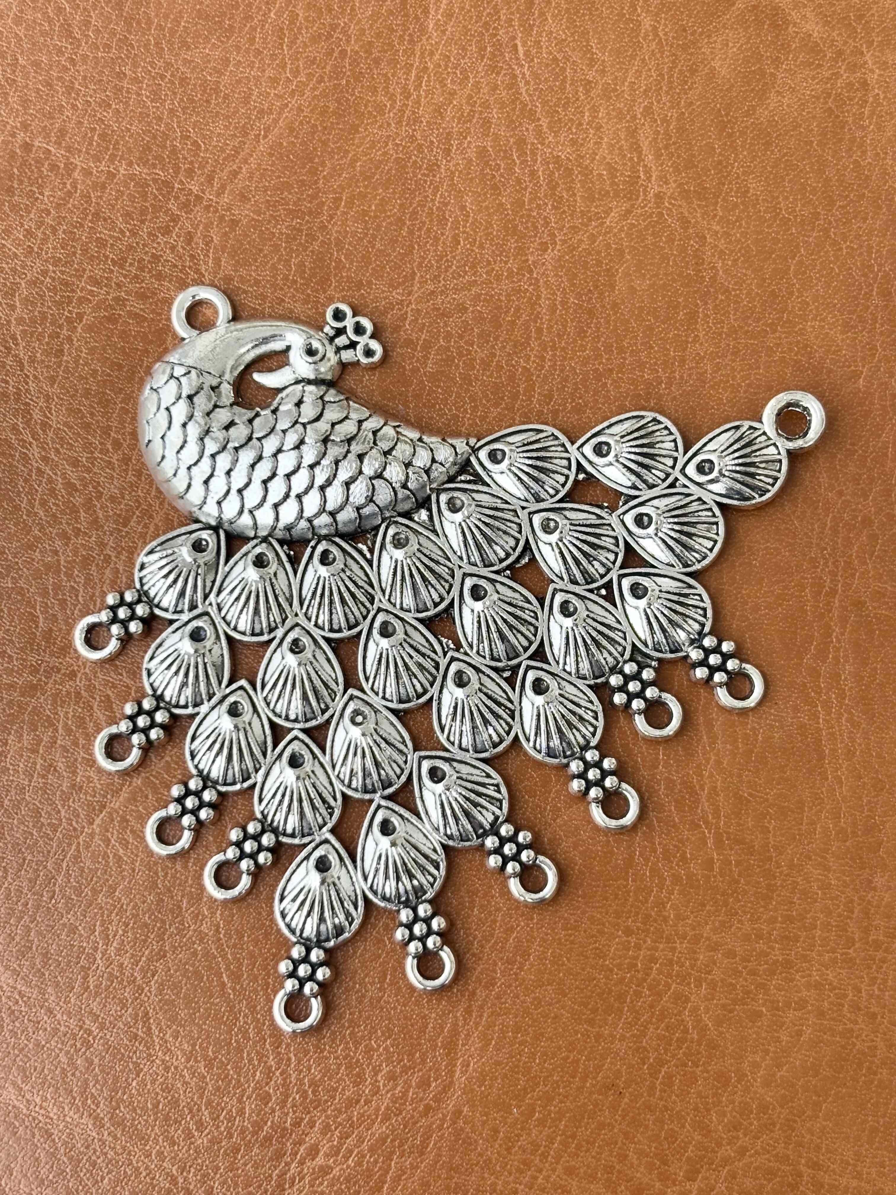 Winged Radiance - Artisan Silver Pendant