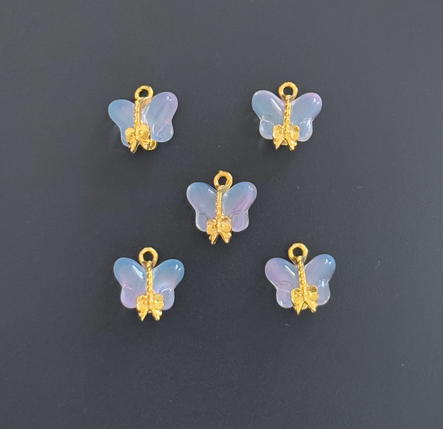 Two Pieces Iridescent Blue Butterfly Charms with Gold Trim